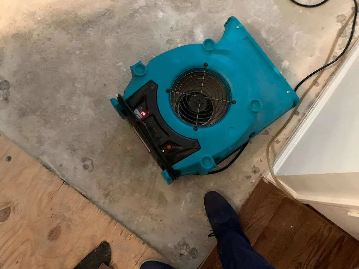 Air mover drying subfloor during Leak Detection & Repair in Murphy
